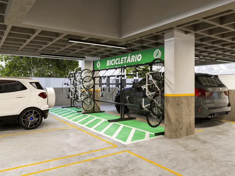 Imagem ilustrativa de bicicletário compartilhado com suportes para bicicletas na garagem