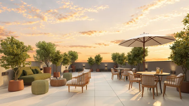 Rooftop do Quasar Residence com lounge e vista da cidade